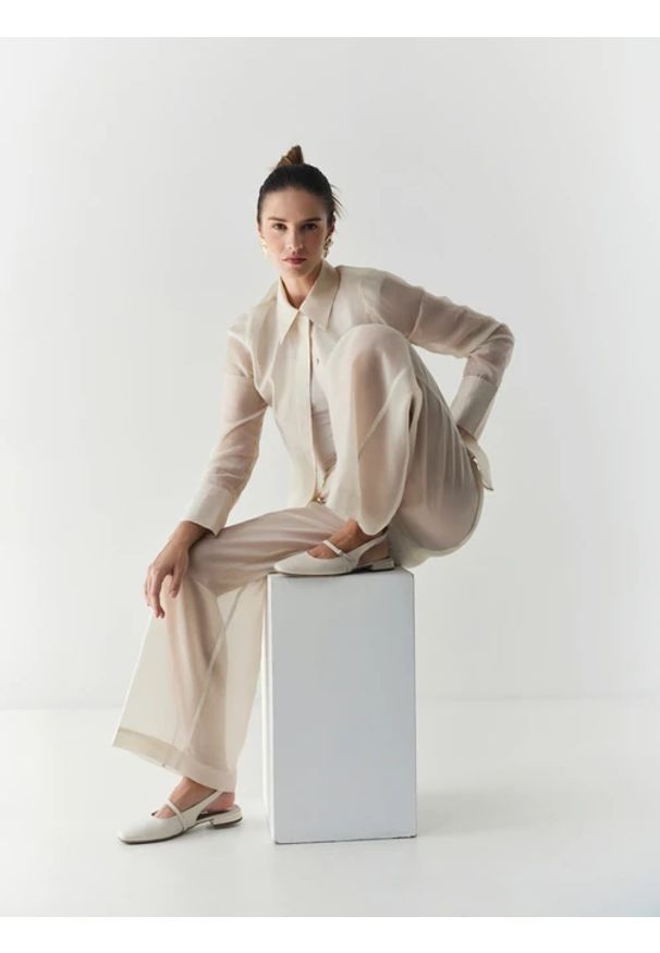 Ryłko - Kremowe czółenka slingback. Zapięcie: pasek. Kolor: beżowy. Materiał: skóra. Obcas: na obcasie. Styl: elegancki, street. Wysokość obcasa: średni