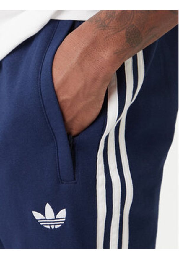 Adidas - adidas Spodnie dresowe 3-Stripes KE3561 Granatowy Slim Fit. Kolor: niebieski. Materiał: bawełna