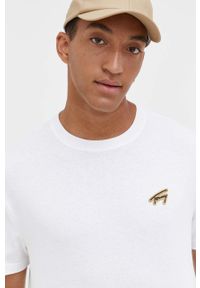 Tommy Jeans t-shirt bawełniany kolor biały z aplikacją. Kolor: biały. Materiał: bawełna. Długość rękawa: krótki rękaw. Długość: krótkie. Wzór: aplikacja. Styl: klasyczny #4