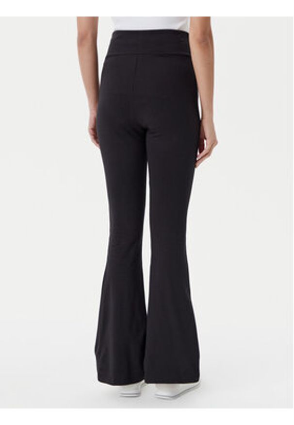 Puma Legginsy Ess 631542 Czarny Flared Fit. Kolor: czarny. Materiał: bawełna