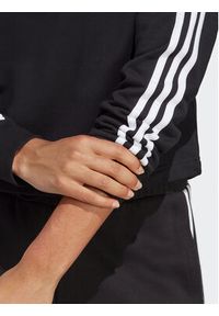 Adidas - adidas Bluza Essentials 3-Stripes French Terry Crop Hoodie IC8767 Czarny Regular Fit. Kolor: czarny. Materiał: bawełna