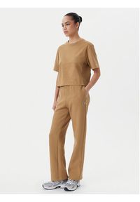 Champion Spodnie dresowe 117983 Brązowy Slim Fit. Kolor: brązowy. Materiał: bawełna #4