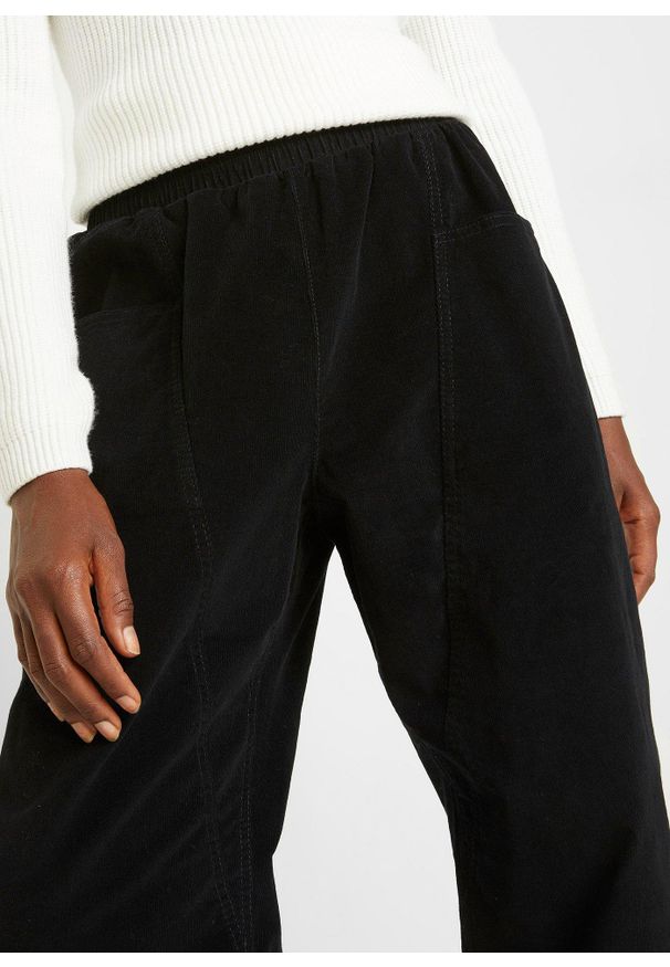 bonprix - Spodnie sztruksowe z mieszanki bawełny. Kolor: czarny. Materiał: bawełna, sztruks