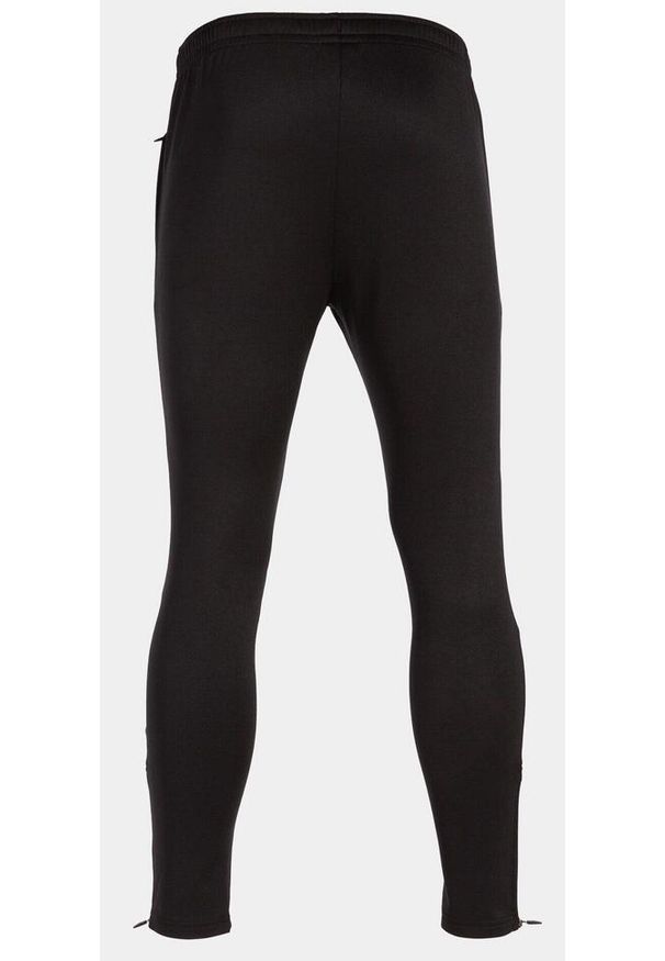 Spodnie sportowe dresowe męskie Joma Championship VII z kieszeniami. Kolor: czarny, czerwony, wielokolorowy. Materiał: dresówka. Długość: długie. Sezon: zima. Sport: piłka nożna, fitness, bieganie