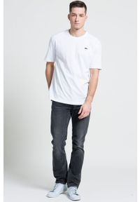 Lacoste T-shirt TH7618 kolor biały gładki TH7618-001. Okazja: na co dzień. Kolor: biały. Materiał: dzianina. Wzór: gładki. Styl: casual #3