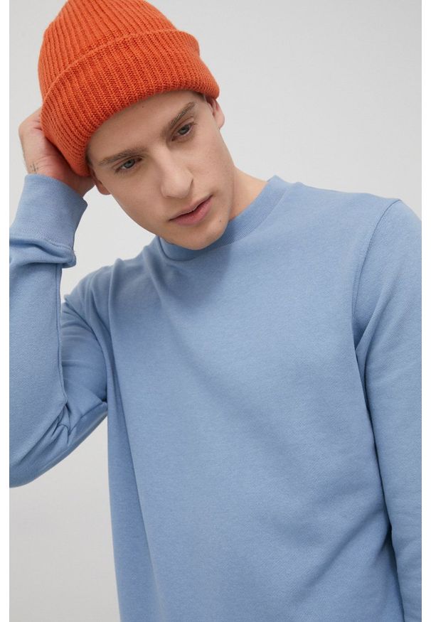 Quiksilver bluza męska gładka. Okazja: na co dzień. Kolor: niebieski. Materiał: bawełna, dzianina, włókno. Wzór: gładki. Styl: casual