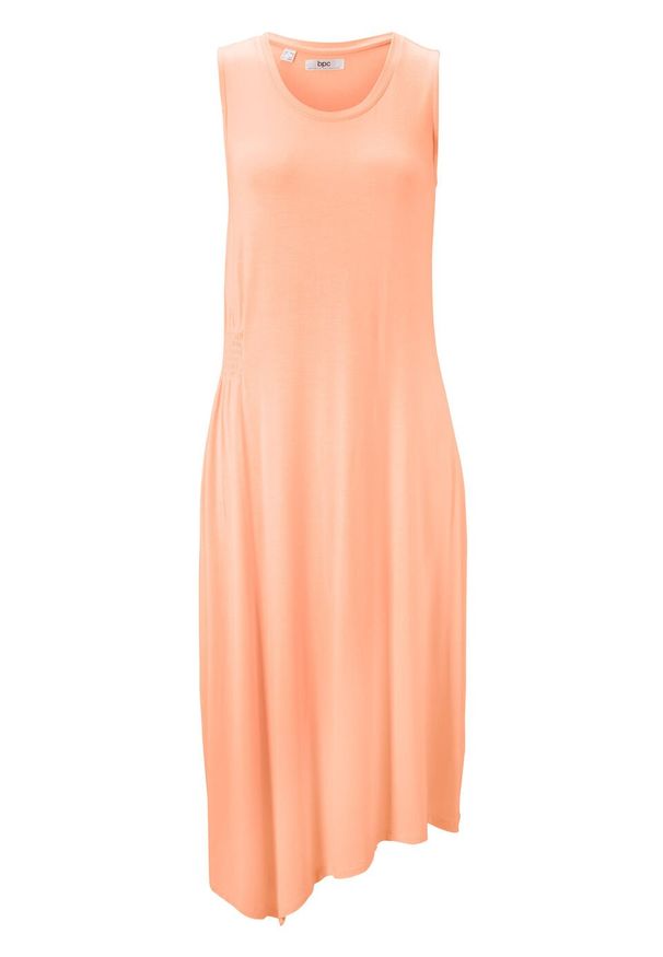 Sukienka z dżerseju z asymetryczną linią dołu i przeszyciem cienkimi gumkami bonprix brzoskwiniowy. Kolor: pomarańczowy. Materiał: jersey. Typ sukienki: asymetryczne