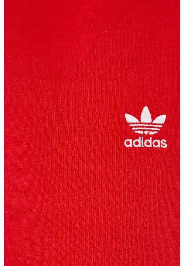 adidas Originals Spodnie damskie kolor czerwony gładkie. Stan: podwyższony. Kolor: czerwony. Materiał: dzianina, poliester, bawełna. Wzór: gładki