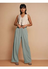 Sinsay - Luźne spodnie wide leg - zielony. Kolor: zielony
