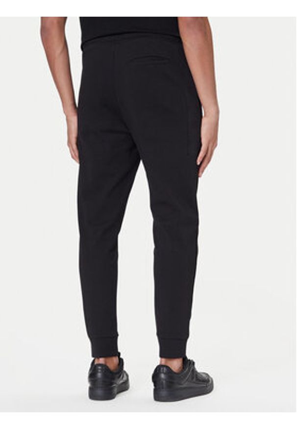 BOSS Spodnie dresowe Future 50543860 Czarny Regular Fit. Kolor: czarny. Materiał: bawełna