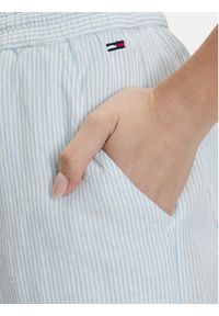 Tommy Jeans Spodnie materiałowe DW0DW22285 Niebieski jasny Loose Fit. Kolor: niebieski. Materiał: len #5