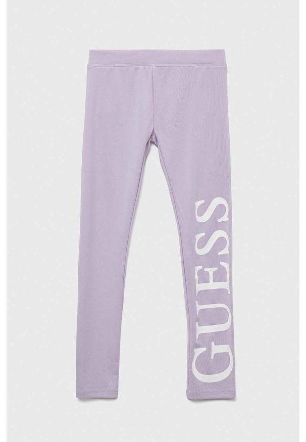 Guess legginsy dziecięce kolor fioletowy z nadrukiem. Kolor: fioletowy. Wzór: nadruk