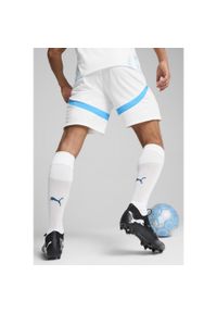 Puma - Szorty meczowe OM 2024/25. Kolor: biały, wielokolorowy, niebieski. Sport: piłka nożna