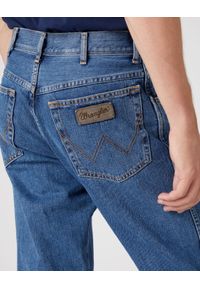 Wrangler - Spodnie jeansowe męskie WRANGLER TEXAS VINTAGE STNWASH. Okazja: na co dzień, na spacer, do pracy. Kolor: niebieski. Materiał: jeans. Styl: vintage