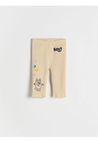 Reserved - Legginsy 3/4 Bluey - beżowy. Kolor: beżowy. Materiał: bawełna. Długość: krótkie #1