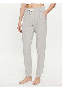 TOMMY HILFIGER - Tommy Hilfiger Spodnie dresowe UW0UW05192 Szary Slim Fit. Kolor: szary. Materiał: dresówka #1