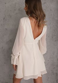 Renee - Beżowa Sukienka Vices Ozdobiona Transparentnymi Rękawami i Kropkami Celziva. Okazja: na co dzień. Kolor: beżowy. Materiał: koronka. Wzór: kropki, aplikacja. Styl: casual, elegancki #2