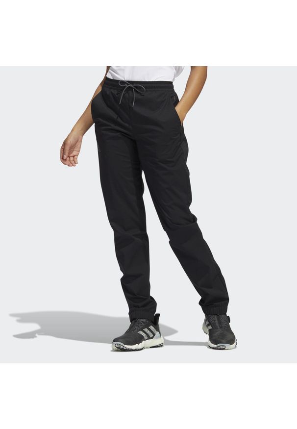 Adidas - Provisional Pants. Kolor: czarny. Materiał: materiał. Sport: golf