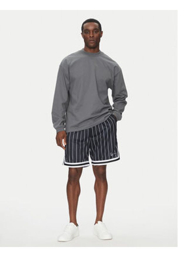 Karl Kani Szorty sportowe Small Signature 6014920 Czarny Relaxed Fit. Kolor: czarny. Materiał: syntetyk. Styl: sportowy