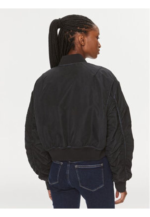 Calvin Klein Jeans Kurtka bomber J20J221378 Czarny Relaxed Fit. Kolor: czarny. Materiał: syntetyk
