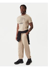 Guess Spodnie dresowe Z6RB03 K9YI1 Beżowy Regular Fit. Kolor: beżowy. Materiał: bawełna #4