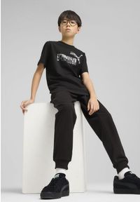 Puma - Młodzieżowa koszulka Essentials Camo PUMA Black. Kolor: czarny. Wzór: moro. Sport: joga i pilates