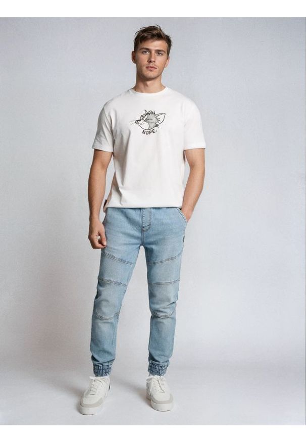 Sinsay - Jeansy jogger z efektem sprania - niebieski. Kolor: niebieski