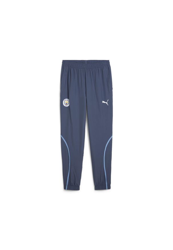 Puma - Męskie spodnie przedmeczowe z tkaniny Manchester City PUMA Inky Blue Team Light. Kolor: niebieski. Materiał: tkanina, dresówka. Sport: piłka nożna