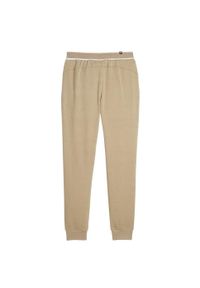 Puma - Spodnie Do Joggingu Męskie Squad. Kolor: beżowy. Materiał: dresówka. Sport: bieganie