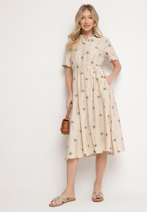 Born2be - Beżowa Rozkloszowana Sukienka z Wiskozy o Koszulowym Kroju z Wiązanym Paskiem Lisalinea. Okazja: na co dzień. Kolor: beżowy. Materiał: wiskoza. Długość rękawa: krótki rękaw. Typ sukienki: koszulowe. Styl: elegancki, klasyczny, casual