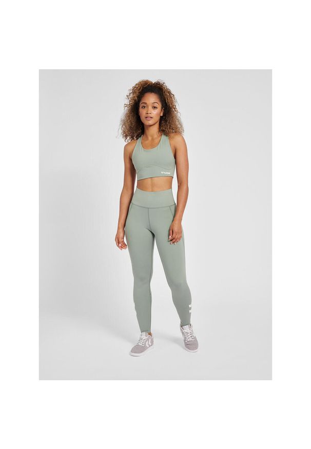 Damskie wysokie legginsy Hummel MT Grace. Kolor: zielony. Materiał: materiał. Wzór: nadruk, jodełka. Sport: fitness