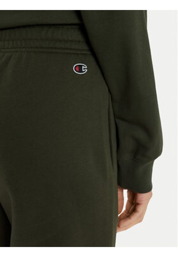 Champion Spodnie dresowe 117583 Zielony Regular Fit. Kolor: zielony. Materiał: bawełna