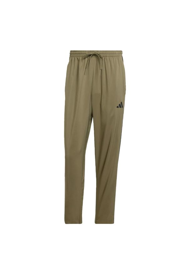 Adidas - Spodnie Essentials 3-Stripes Stanford Open Hem. Kolor: wielokolorowy, beżowy, czarny. Materiał: materiał
