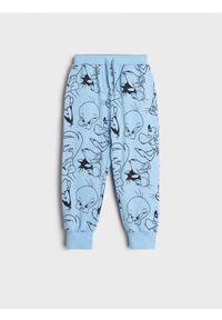 Sinsay - Spodnie dresowe jogger Looney Tunes - niebieski. Kolor: niebieski. Materiał: dresówka. Wzór: nadruk