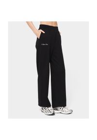 Szerokie spodnie dresowe dla kobiet Carpatree Sports Club. Kolor: czarny. Materiał: dresówka. Sport: fitness #1