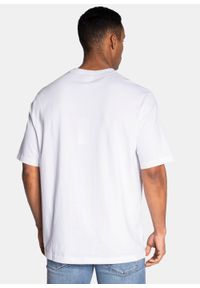 Koszulka męska biała Lacoste TH9162.001. Typ kołnierza: polo. Kolor: biały. Materiał: dzianina. Długość: krótkie. Sezon: lato. Sport: bieganie #3