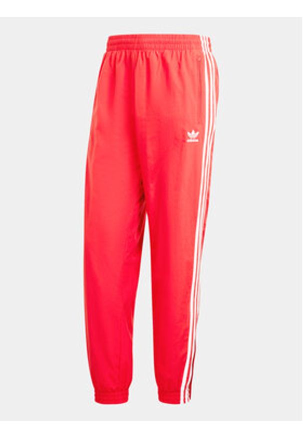 Adidas - adidas Spodnie dresowe Adicolor Woven Firebird IT2498 Czerwony Regular Fit. Kolor: czerwony. Materiał: syntetyk