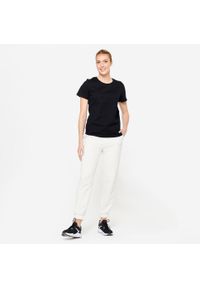 DOMYOS - Spodnie dresowe damskie Domyos Gym & Pilates. Kolor: biały. Materiał: bawełna, materiał, poliester, elastan. Wzór: ze splotem. Sport: joga i pilates