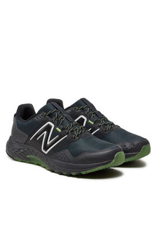 New Balance Buty 410v8 MT410GK8 Czarny. Kolor: czarny. Materiał: materiał