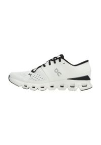Buty do biegania damskie On Running Cloud X 4. Kolor: biały. Materiał: materiał, syntetyk, tkanina. Szerokość cholewki: normalna. Sport: bieganie