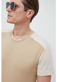 Calvin Klein Jeans t-shirt bawełniany kolor brązowy wzorzysty. Kolor: beżowy. Materiał: bawełna #1