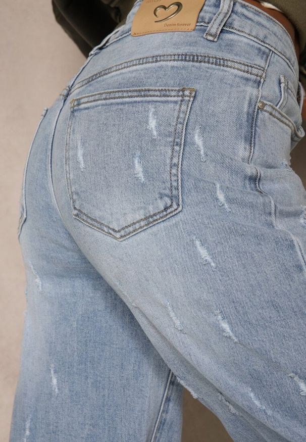 Renee - Niebieskie Jeansy z Bawełny o Szerokim Kroju High Waist Ozdobione Przetarciami Feless. Stan: podwyższony. Kolor: niebieski. Wzór: aplikacja. Sezon: lato