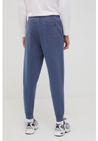 Tommy Jeans spodnie męskie z aplikacją. Kolor: niebieski. Materiał: bawełna. Wzór: aplikacja