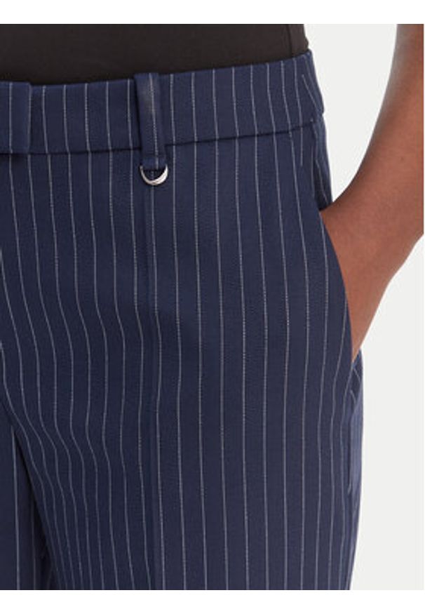 Hugo - HUGO Spodnie materiałowe Hilando 50554458 Granatowy Slim Fit. Kolor: niebieski. Materiał: syntetyk
