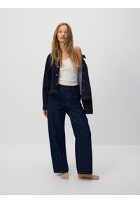 Reserved - Jeansy baggy z kryształkami - granatowy. Kolor: niebieski