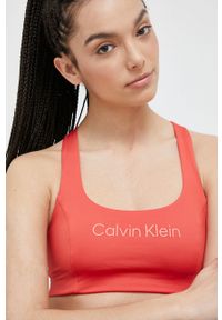 Calvin Klein Performance biustonosz sportowy Essentials kolor pomarańczowy. Kolor: pomarańczowy. Materiał: skóra. Sport: fitness, taniec #3