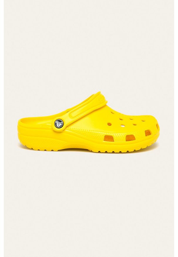 Crocs klapki Classic kolor żółty 10001. Nosek buta: okrągły. Kolor: żółty. Materiał: materiał, guma. Wzór: gładki