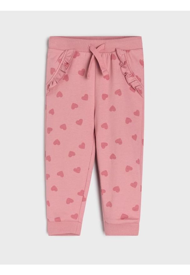 Sinsay - Bawełniane spodnie jogger - różowy. Kolor: różowy. Materiał: bawełna