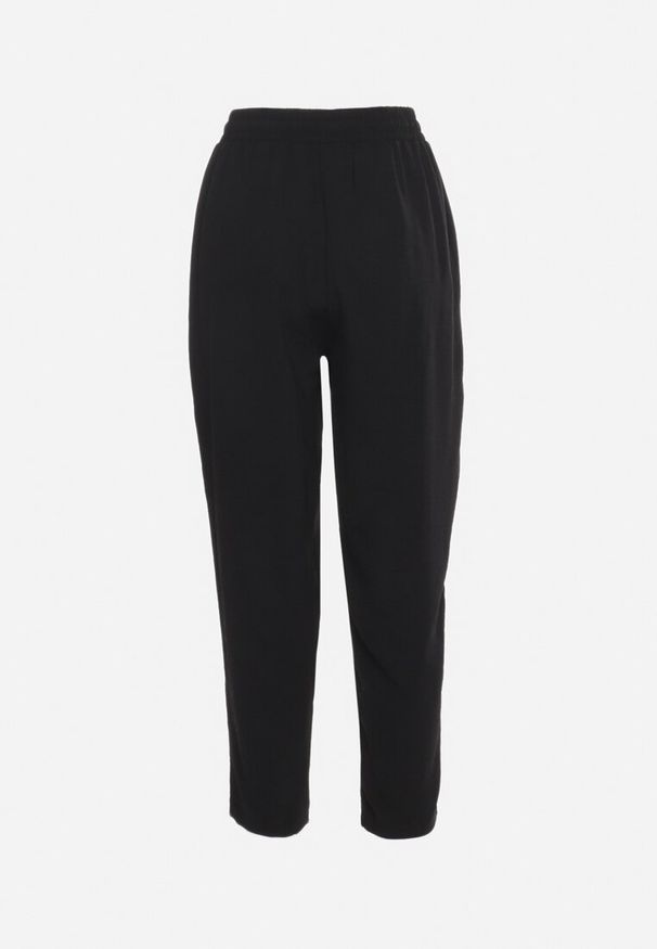 Born2be - Czarne Spodnie Luźne z Kieszeniami i Gumką w Talii oraz Sznurkiem Enivia. Okazja: na co dzień. Kolor: czarny. Styl: casual, elegancki