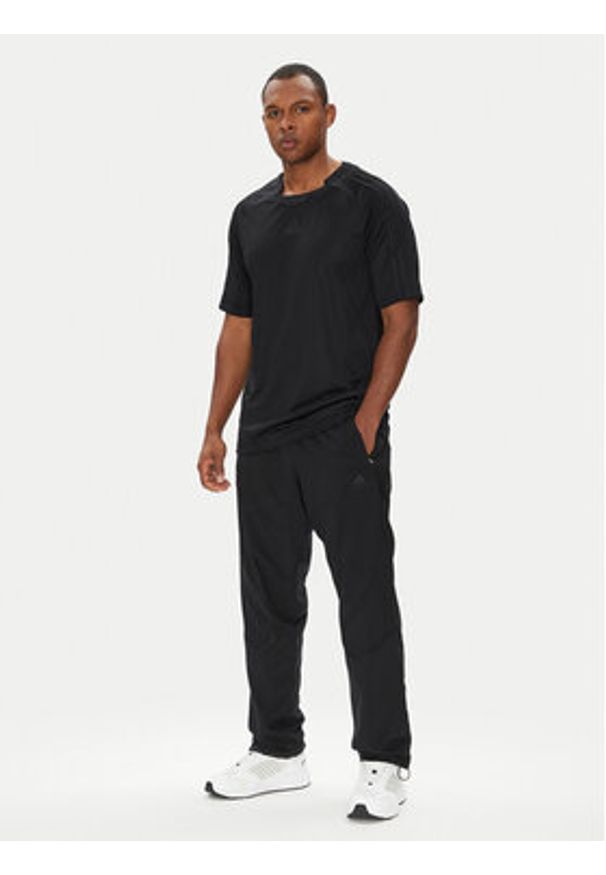 Adidas - adidas T-Shirt Teamgeist adicolor JX1537 Czarny Loose Fit. Kolor: czarny. Materiał: syntetyk